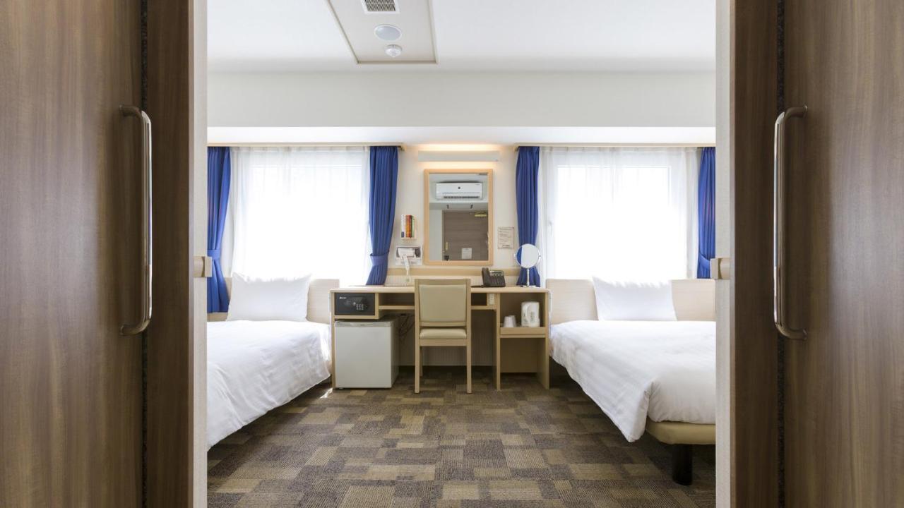 Toyoko Inn Tokyo Keihin Tohoku Sen Oji Eki Kita Guchi Buitenkant foto